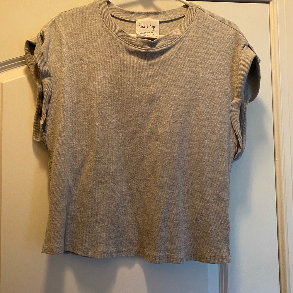 Muscle style grey top.